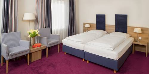 Imagen de la habitación del Hotel Am Schlosspark. Foto 4