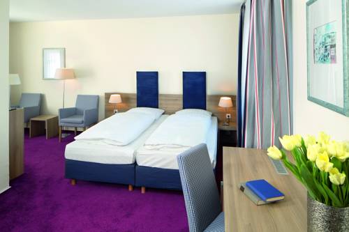 Imagen de la habitación del Hotel Am Schlosspark. Foto 7