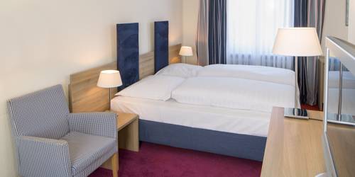 Imagen de la habitación del Hotel Am Schlosspark, Husum. Foto 14