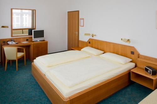 Imagen de la habitación del Hotel Am Stadtpark, Buxtehude. Foto 9
