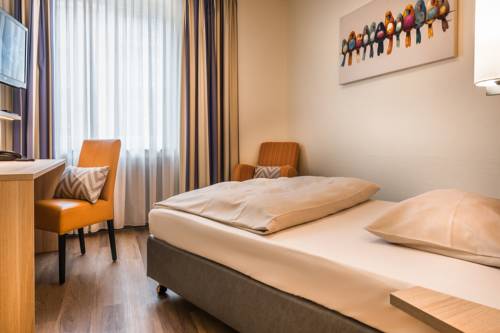 Imagen de la habitación del Hotel Am Stadtpark, Hilden. Foto 4