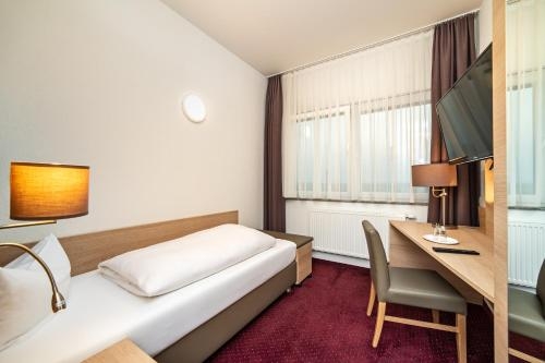 Imagen de la habitación del Hotel Am Stadtrand, Ostfildern. Foto 10