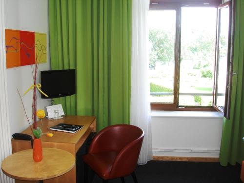 Imagen de la habitación del Hotel Am Tiefwarensee. Foto 5