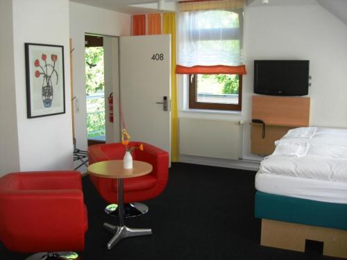 Imagen de la habitación del Hotel Am Tiefwarensee. Foto 7