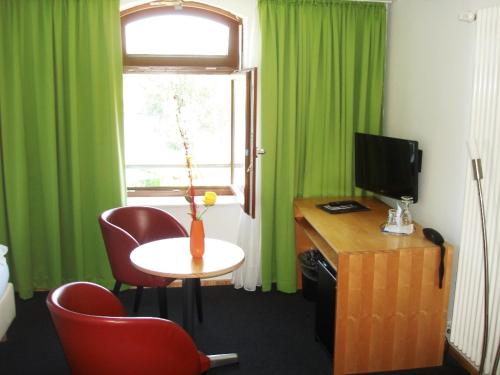 Imagen de la habitación del Hotel Am Tiefwarensee. Foto 8