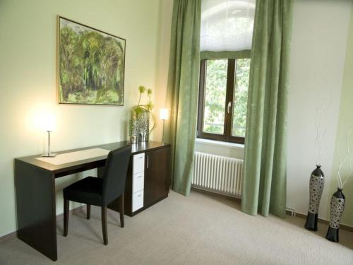 Imagen de la habitación del Hotel Am Tiefwarensee. Foto 9