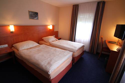 Imagen de la habitación del Hotel Am Tiergarten. Foto 6