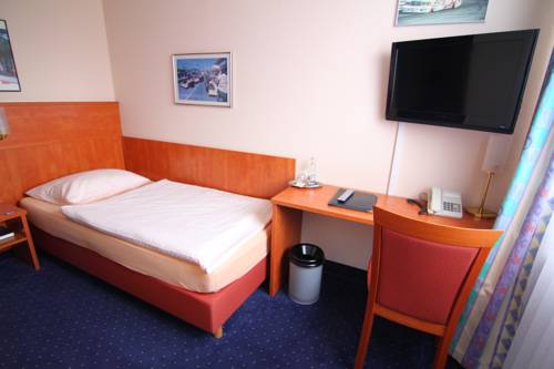 Imagen de la habitación del Hotel Am Tiergarten. Foto 11