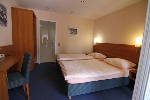 Imagen de la habitación del Hotel Am Tiergarten. Foto 12