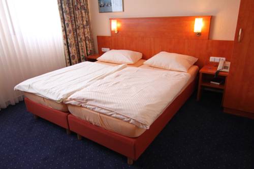 Imagen de la habitación del Hotel Am Tiergarten. Foto 14