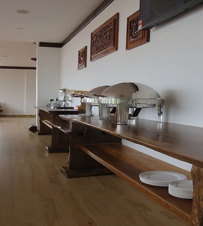 Imagen del bar/restaurante del Hotel Am Transit Inn. Foto 5