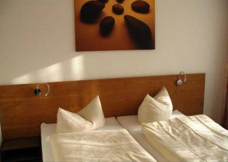 Imagen de la habitación del Hotel Am Wasserturm. Foto 4