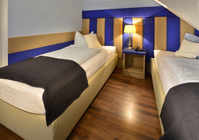 Imagen de la habitación del Hotel Am Wehrhahn. Foto 9