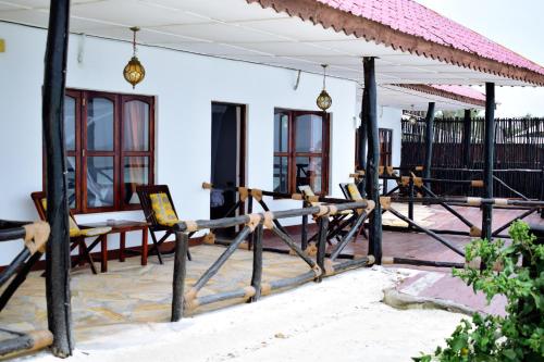 Imagen de la habitación del Hotel Amaan Beach Bungalows. Foto 7