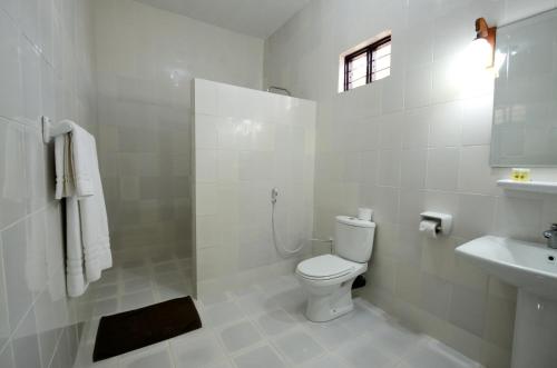 Imagen de la habitación del Hotel Amaan Beach Bungalows. Foto 8