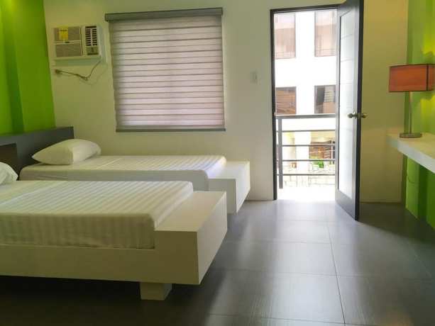 Imagen de la habitación del Hotel Amable Suites Hotel. Foto 3