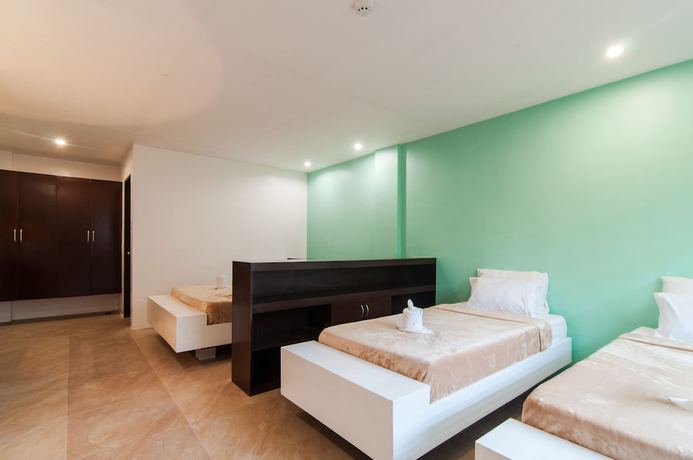 Imagen de la habitación del Hotel Amable Suites Hotel. Foto 5