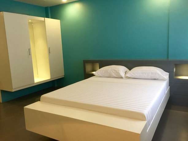 Imagen de la habitación del Hotel Amable Suites Hotel. Foto 6
