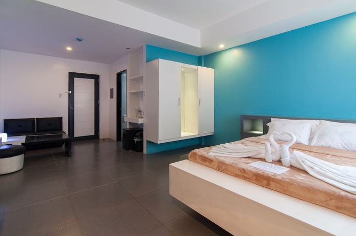 Imagen de la habitación del Hotel Amable Suites Hotel. Foto 8