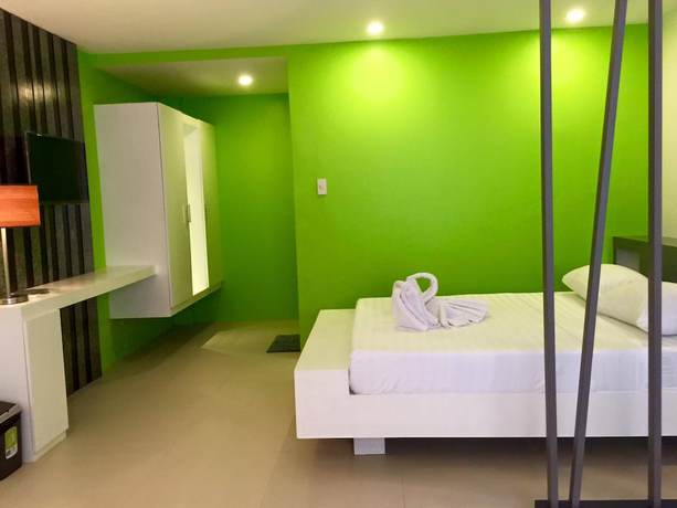 Imagen de la habitación del Hotel Amable Suites Hotel. Foto 9