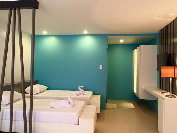 Imagen de la habitación del Hotel Amable Suites Hotel. Foto 12
