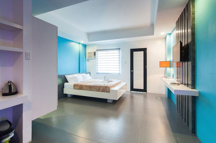 Imagen de la habitación del Hotel Amable Suites Hotel. Foto 13