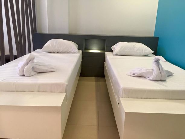 Imagen de la habitación del Hotel Amable Suites Hotel. Foto 14