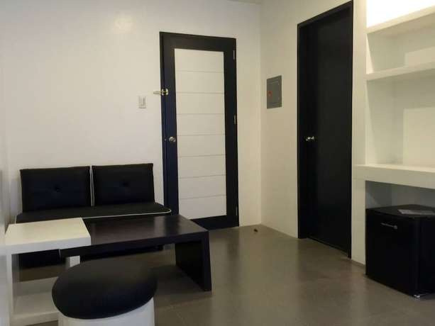 Imagen de la habitación del Hotel Amable Suites Hotel. Foto 19