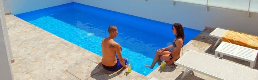 Imagen de la piscina del Hotel Amadei Figaro and Apartments. Foto 18