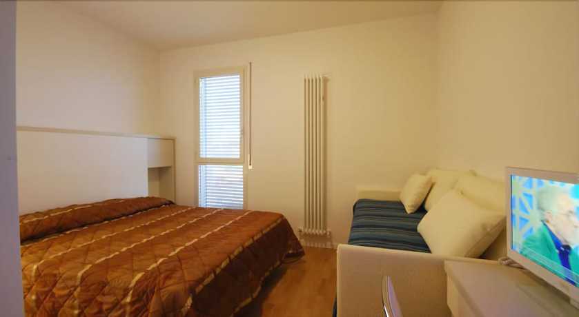 Imagen de la habitación del Hotel Amadei Figaro and Apartments. Foto 7