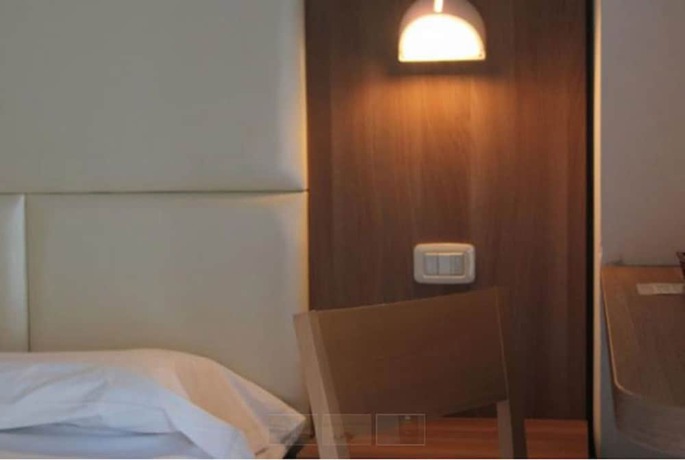 Imagen de la habitación del Hotel Amadei Figaro and Apartments. Foto 11