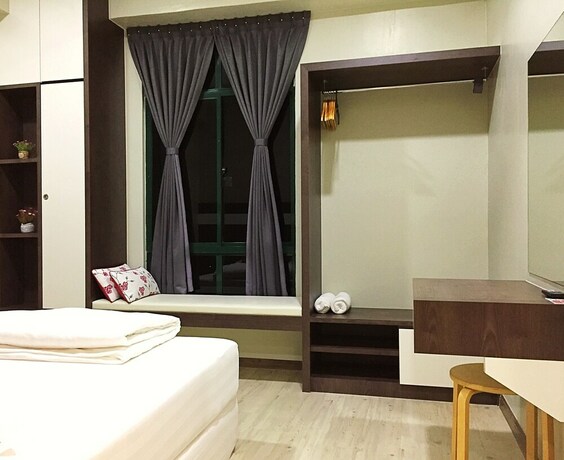 Imagen de la habitación del Hotel Amadel Residence. Foto 15