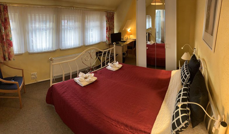 Imagen de la habitación del Hotel Amadeus Boutique Deutscher Hof Inn and Suites. Foto 9