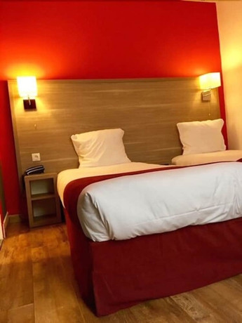 Imagen de la habitación del Hotel Amadeus, París. Foto 15