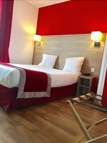 Imagen de la habitación del Hotel Amadeus, París. Foto 17