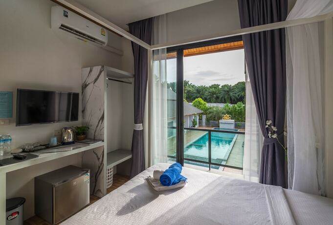 Imagen de la habitación del Hotel Amadha Villas Retreat. Foto 20