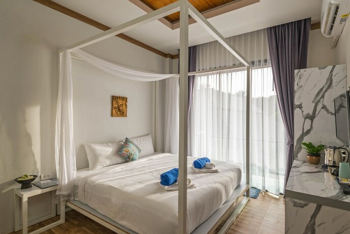 Imagen de la habitación del Hotel Amadha Villas Retreat. Foto 21