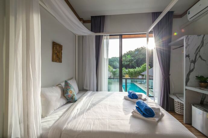 Imagen de la habitación del Hotel Amadha Villas Retreat. Foto 24