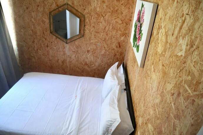 Imagen de la habitación del Hotel Amadora Boutique Hostel. Foto 12