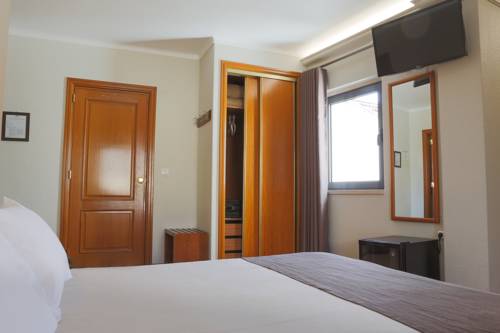Imagen de la habitación del Hotel Amadora Palace. Foto 2