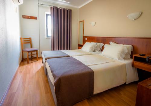 Imagen de la habitación del Hotel Amadora Palace. Foto 6