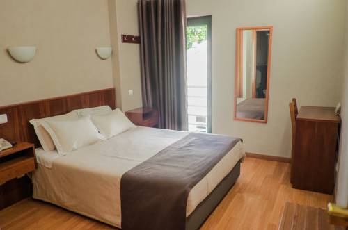 Imagen de la habitación del Hotel Amadora Palace. Foto 10