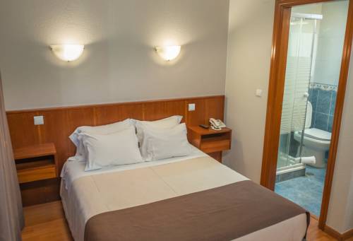 Imagen de la habitación del Hotel Amadora Palace. Foto 11