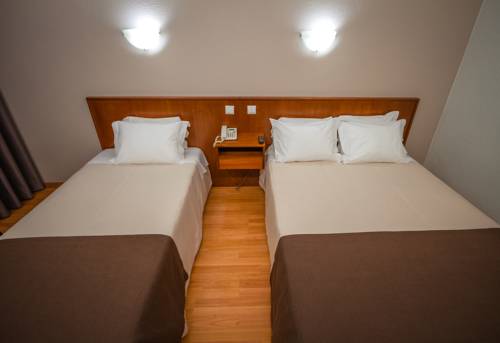 Imagen de la habitación del Hotel Amadora Palace. Foto 14