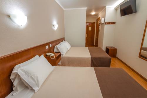 Imagen de la habitación del Hotel Amadora Palace. Foto 15