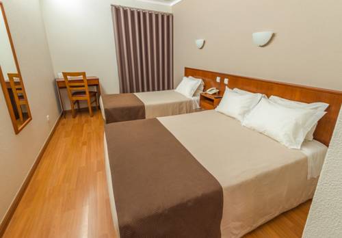 Imagen de la habitación del Hotel Amadora Palace. Foto 16