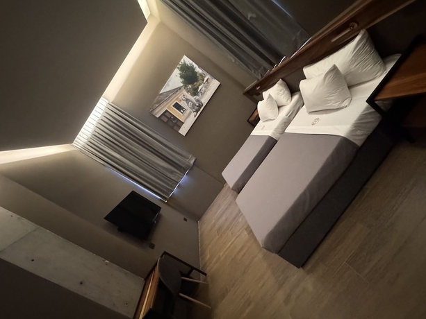 Imagen de la habitación del Hotel Amae21 Lofts. Foto 11