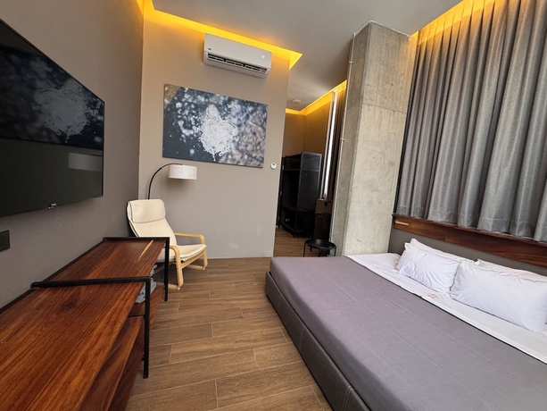 Imagen de la habitación del Hotel Amae21 Lofts. Foto 15