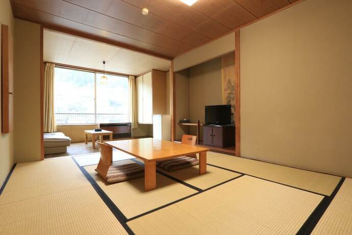 Imagen de la habitación del Hotel Amagase Onsen Tenryuso. Foto 17