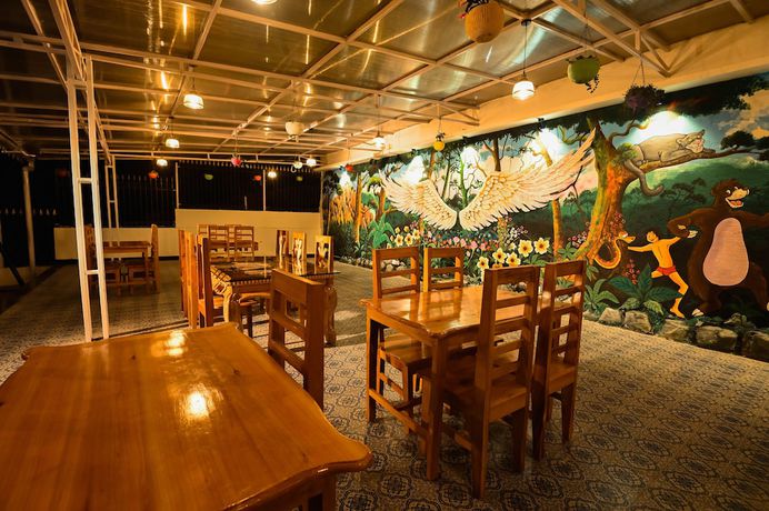 Imagen del bar/restaurante del Hotel Amaira Resort And Farms - Mirik, West Bengal. Foto 4